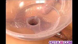 Kawai Yui gets vibrator and glass in pussy